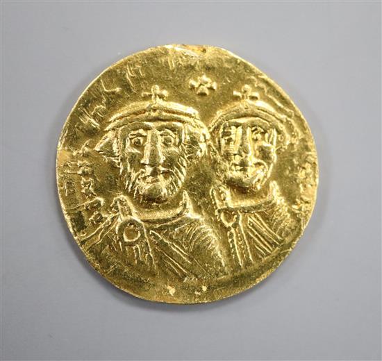 A Byzantine histamenon gold coin.